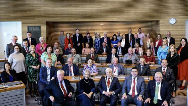 Mayor of the County Cork, Cllr. Frank O'Flynn, Chief Executive of Cork County Council, Valerie  O'Sullivan and Elected members of Cork County Council seated in the Council Chamber.