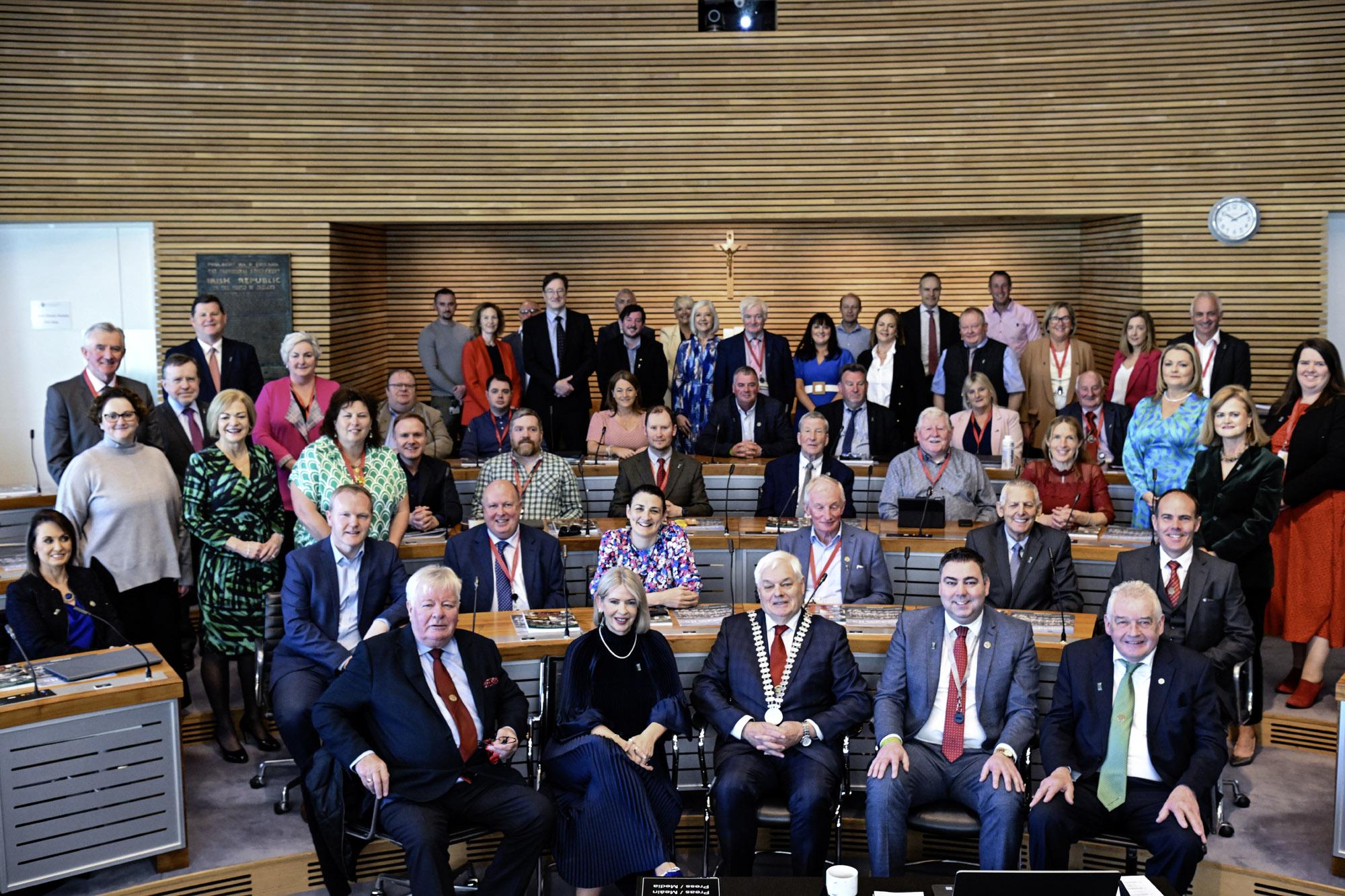 Mayor of the County Cork, Cllr. Frank O'Flynn, Chief Executive of Cork County Council, Valerie  O'Sullivan and Elected members of Cork County Council seated in the Council Chamber.