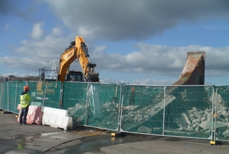 Demolition of a reinforced concrete encased steel chute.