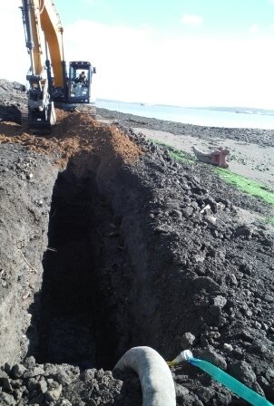 Construction machinery digging a hole