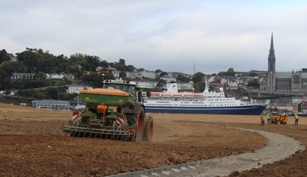 A tractor hauling seed machinery