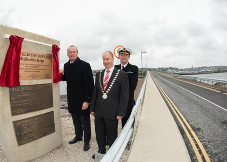 3 Men unveiling a plaque