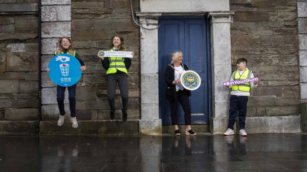 Mayor with students from Bunscoil Mhuire holding campaign signs