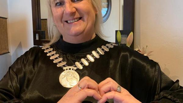 Mayor Linehan Foley making a  heart shape with her hands