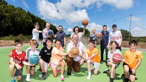 Launch of Crosshaven Multi Use Games Area with Mayor of the County of Cork, Cllr. Danny Collins, local basketball team and member of Cork County Council