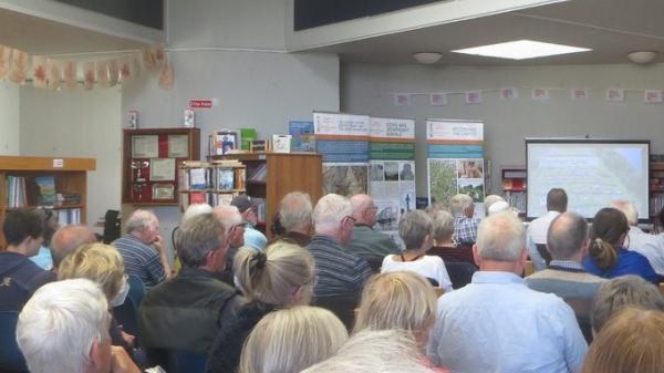 An image of a crowd in a library