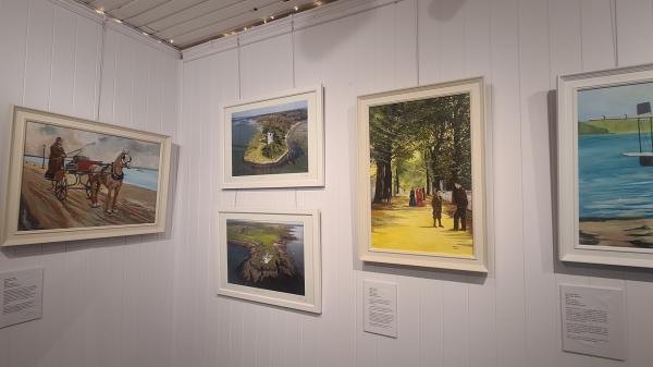 5 paintings which make up part of the 'Echoes of a Harbour' exhibition in Cobh.