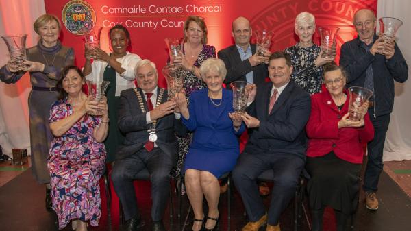 Mayor of the County of Cork, Cllr. Frank O'Flynn and Michael Lynch, Divisional Manager, Cork County Council with the winners on stage at the Mayor's Community Awards.