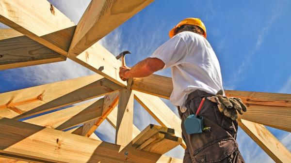 Carpenter working on a construction site.