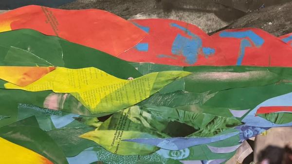 Artistic Collage in red, green, blue, black and yellow.