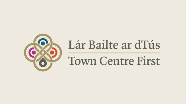 Celtic knot logo with text "Lár Bailte ar dTús, Town Centre First."