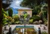 A designed garden with pond and pavilion