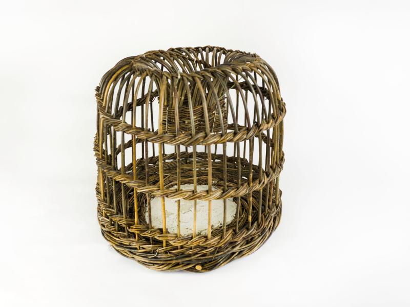 A lobster pot with a white bacground