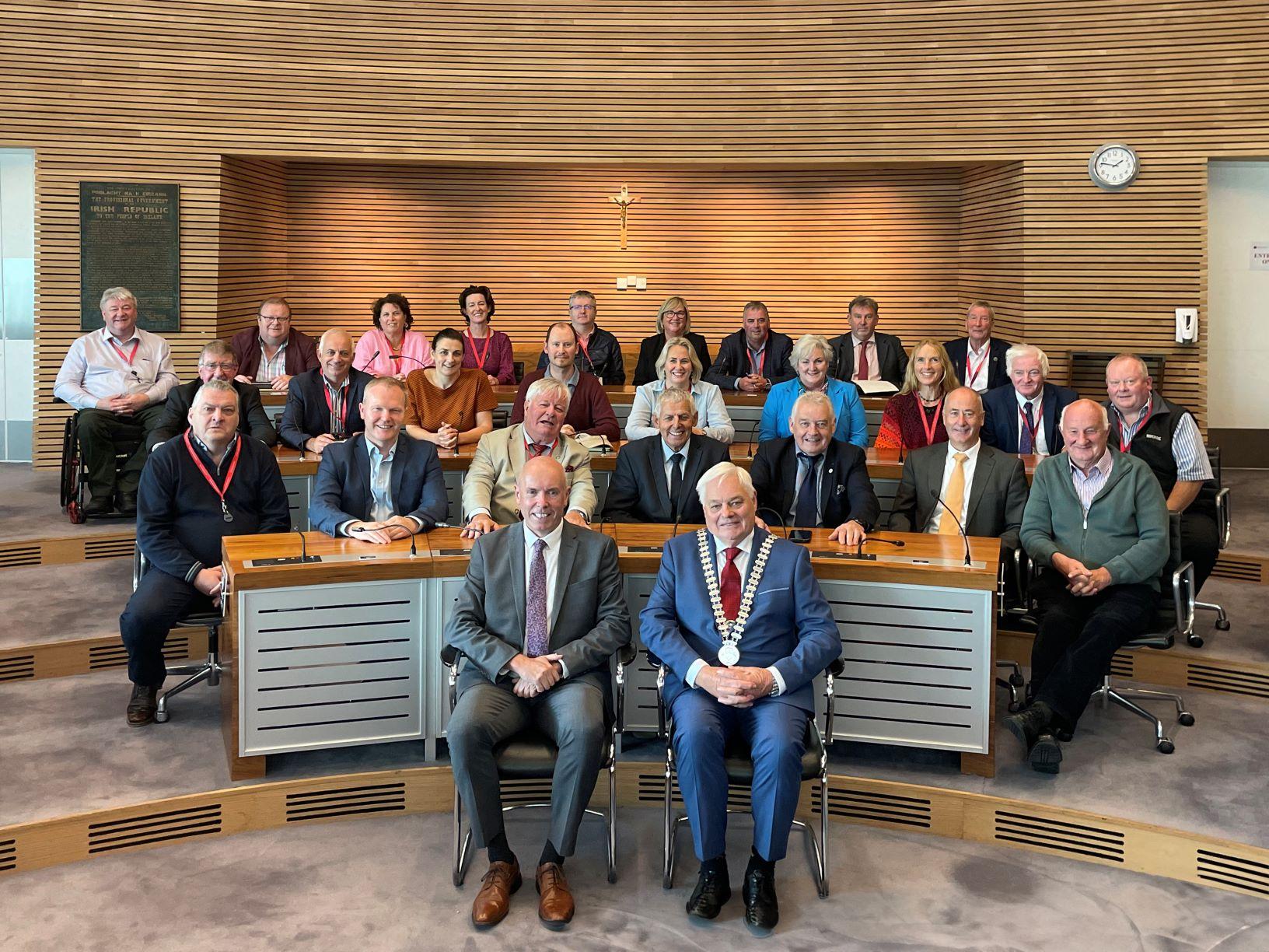 A group of councillors sitting in the council chambers